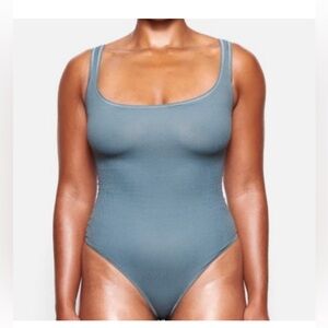 Skims ribbed stretch cotton bodysuit in Kyanite
